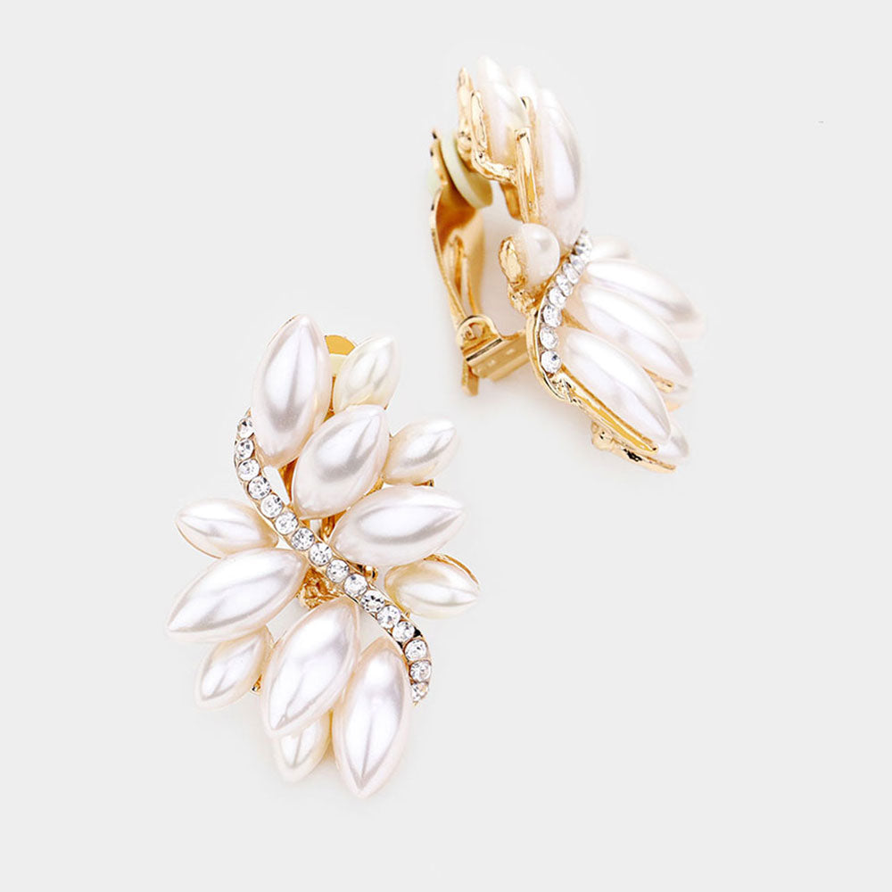 Gold clip earrings and white rhinestones